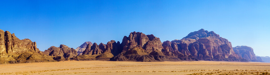 Panoramic view of sandstone cliffs, in Wadi Rum
