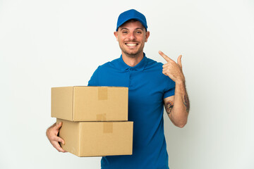 Delivery caucasian man isolated on white background giving a thumbs up gesture