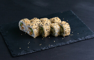 Sushi roll sushi with prawn, avocado, cream cheese, sesame. Sushi menu. Japanese food.
