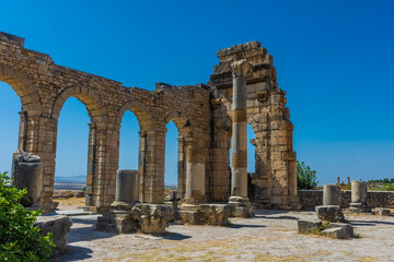 Fototapeta na wymiar Roman arches in the ruins of Volubilis, Morocco