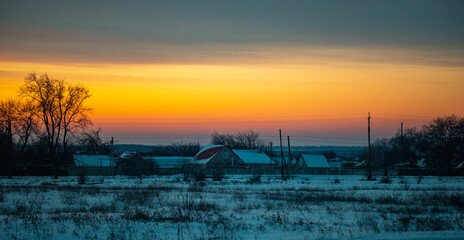 Fototapeta na wymiar sunset over the village