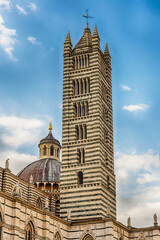 Fototapeta na wymiar Belltower of the gothic Cathedral of Siena, Tuscany, Italy