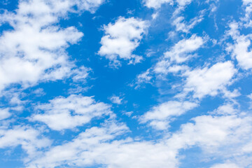 Fototapeta na wymiar Fast moving clouds in the blue sky