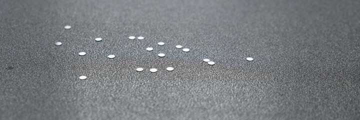 Happy New Year and Merry Christmas. Silver accessories on a shiny silver background