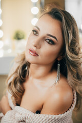 Portrait of a very beautiful girl with makeup and studio light