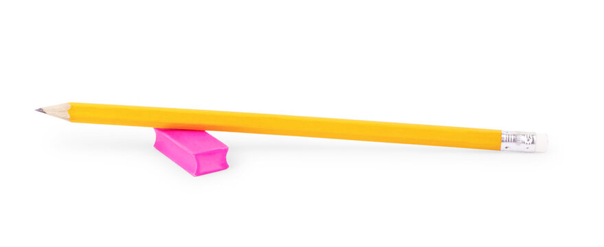 close up view ruler, an eraser and a pencil are isolated on a white background