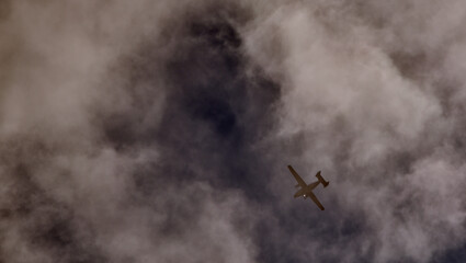 military transport plane against the blue sky