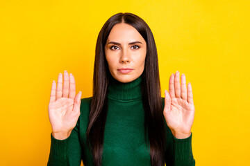 Photo of young unhappy upset sad woman showing no stop sign prohibition restriction isolated on...