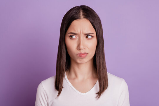 Photo Of Young Woman Unhappy Sad Upset Negative Moody Doubt Think Look Empty Space Isolated Over Violet Color Background