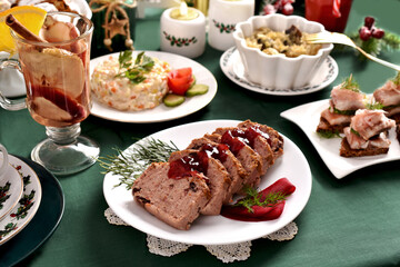 Traditional Christmas Eve dishes on festive table