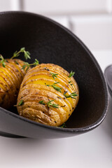 Grilled potato with thyme, pepper and sauce