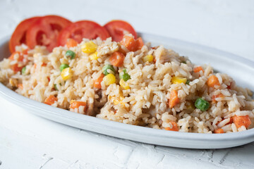 Fried rice with mixed vegetables and pork, top view