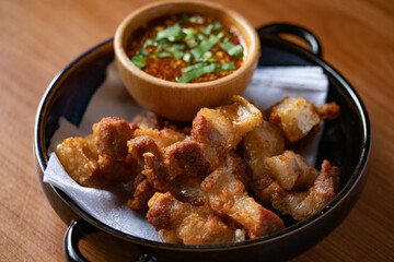 Deep-fried pork belly with fish sauce and spicy dipping sauce