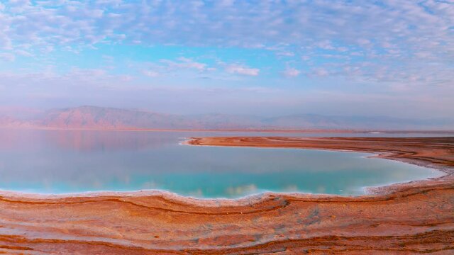 Incredible aerial view on the dead sea with beautiful mountains near sunset