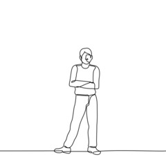 man stands in full growth with his arms crossed all his weight is transferred to one leg - one line drawing vector. concept of confident but closed pose, tired of waiting