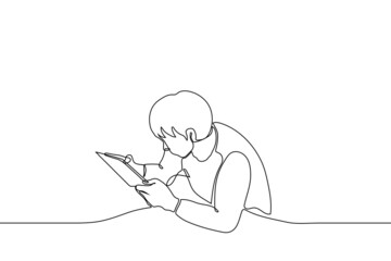 man holding tablet with both hands in horizontal position - one line drawing vector. concept male gamer playing game on tablet or man watching video or movie