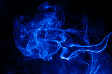 Movement blue smoke on black background.