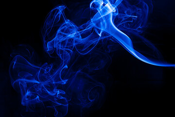 Movement blue smoke on black background.