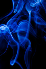 Motion blue smoke on black background.