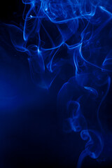 Motion blue smoke on black background.