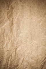 Textured crumpled packaging brown paper background.