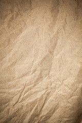 Textured crumpled packaging brown paper background.