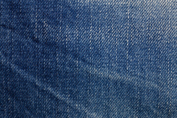Naklejka premium Jeans closeup texture background.