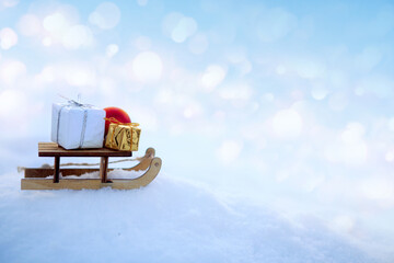 Christmas background with snow and wood sled stand in white snow.