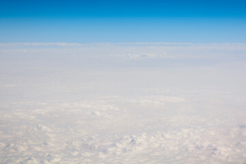 Over clouds of the sky