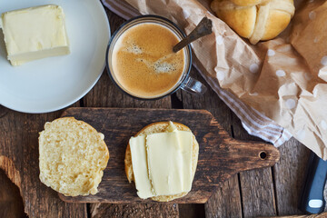 Cross buns. Wooden background, side view, coffee.
