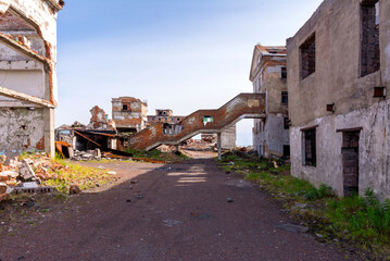 The territory of the former coal mine. Abandoned mine in the former settlement of Khalmer-Yu, Vorkuta, Russia.