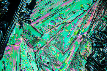 Colorful crystals under microscope, polarization colors, polar filters