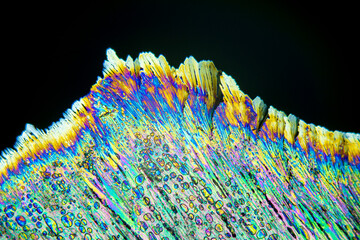 Colorful crystals under microscope, polarization colors, polar filters