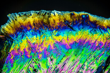 Colorful crystals under microscope, polarization colors, polar filters