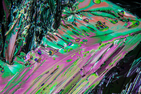 Colorful crystals under microscope, polarization colors, polar filters