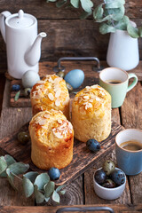 Easter cake with almond chips. Wooden background, side view