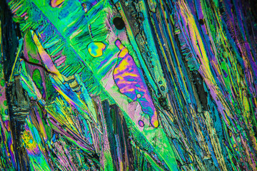 Colorful crystals under microscope, polarization colors, polar filters