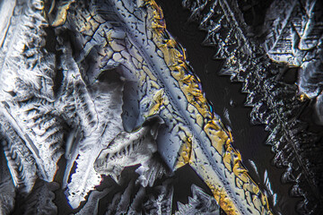 Colorful crystals under microscope, polarization colors, polar filters