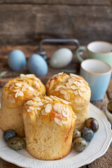 Easter cake with almond chips. Wooden background, side view