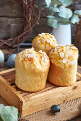 Easter cake with almond chips. Wooden background, side view