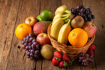 Naklejka na ściany i meble Assortment of fresh fruits on the table.