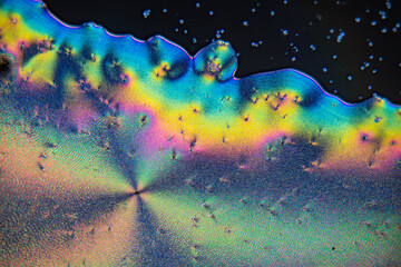 Colorful crystals under microscope, polarization colors, polar filters