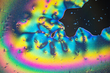 Colorful crystals under microscope, polarization colors, polar filters