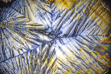 Colorful crystals under microscope, polarization colors, polar filters