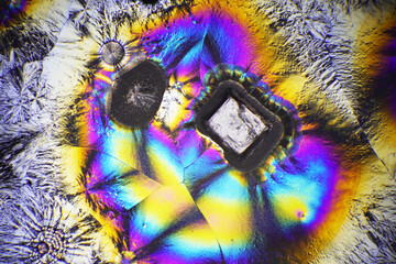 Colorful crystals under microscope, polarization colors, polar filters