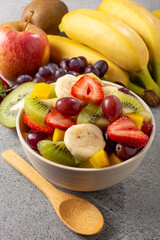 Fruit salad in bowl on the table.