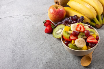 Fruit salad in bowl on the table.
