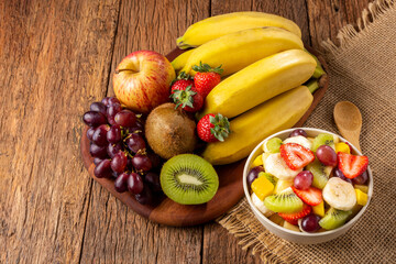 Fruit salad in bowl on the table.