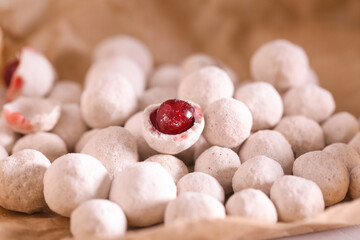 cranberries in powdered sugar are on the table