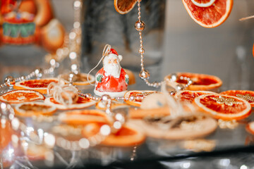 Сhristmas composition of oranges and Santa claus